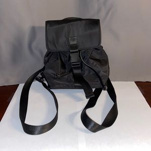 It’s a mini Forever 21 black bag.